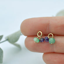 Emerald and Amethyst 9ct yellow gold circle studs