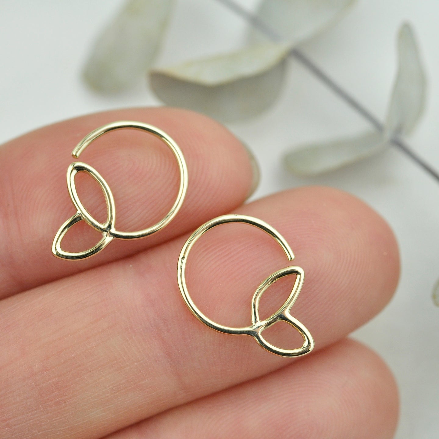 Tiny leaf sleeper hoops 9ct yellow gold, pair.