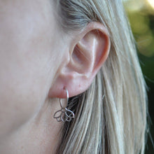 Diamond everyday sleeper hoops silver lotus earring, April birthstone.