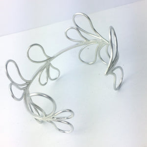 Statement solid silver cuff, unique Paisley loop design.