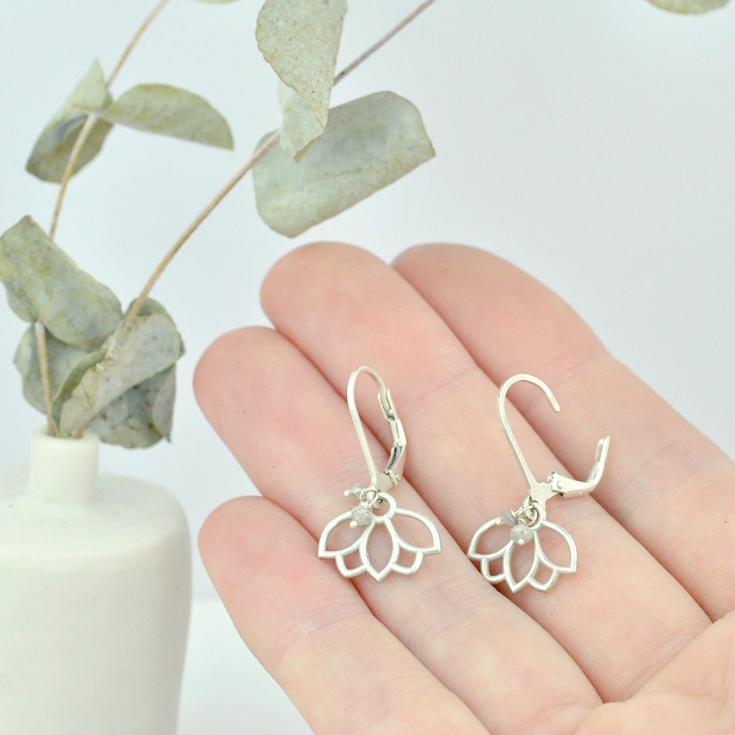 Grey diamond small hoops silver lotus earring.
