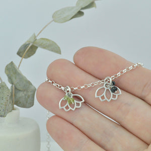 Peridot August Birthstone sterling silver bracelet with Lotus petal charm.