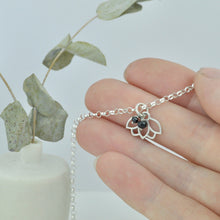 Black Spinel August Birthstone sterling silver bracelet with Lotus petal charm.