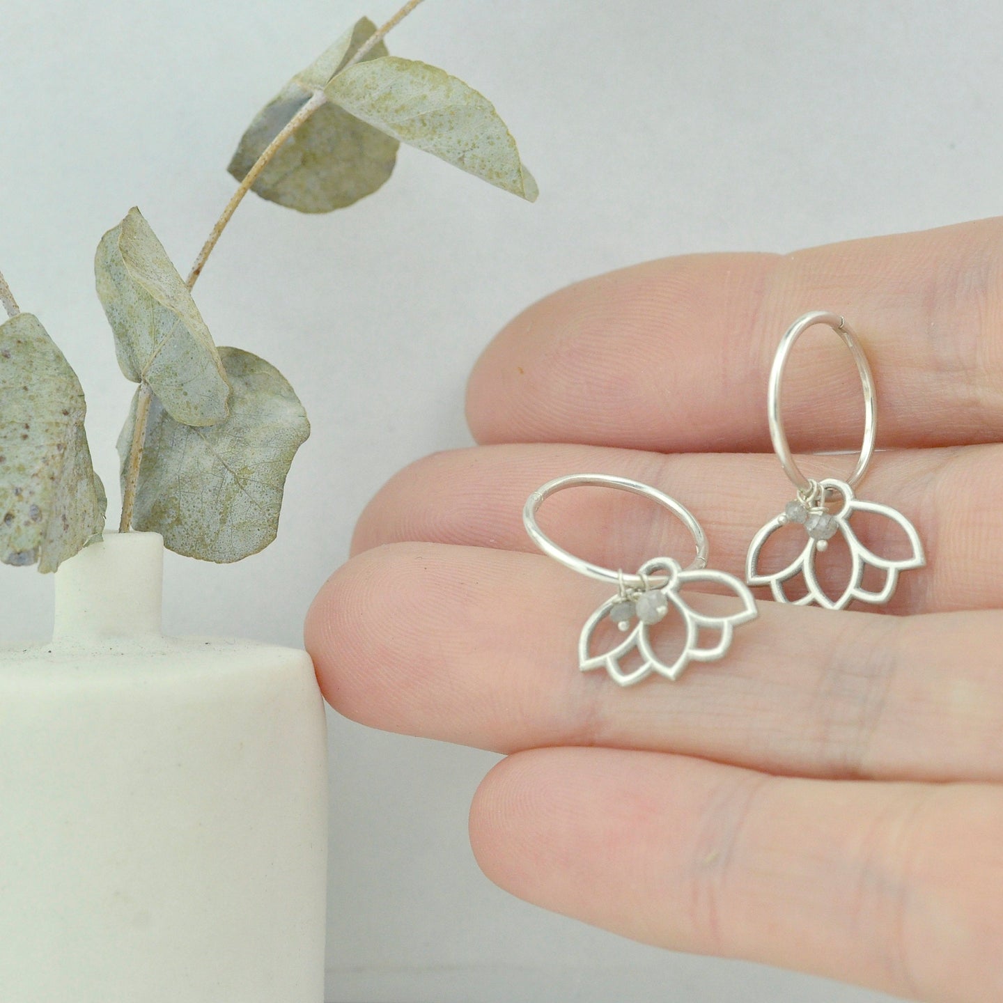Diamond everyday sleeper hoops silver lotus earring, April birthstone.