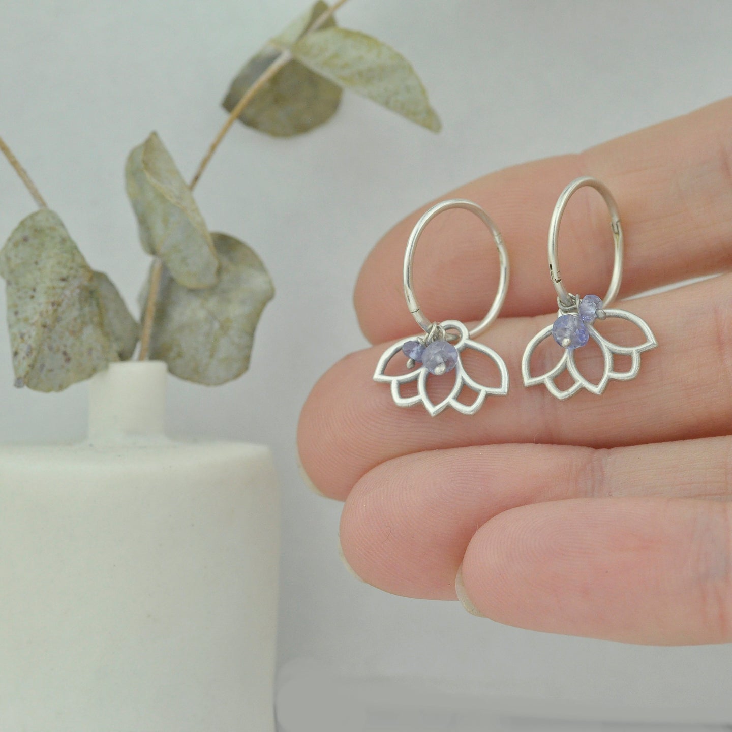 Tanzanite December birthstone solid silver sleeper hoops, lotus charm.