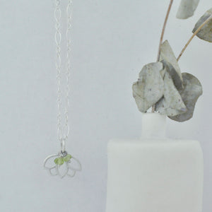 Peridot August Birthstone sterling silver Lotus charm necklace.