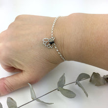 Black Spinel August Birthstone sterling silver bracelet with Lotus petal charm.