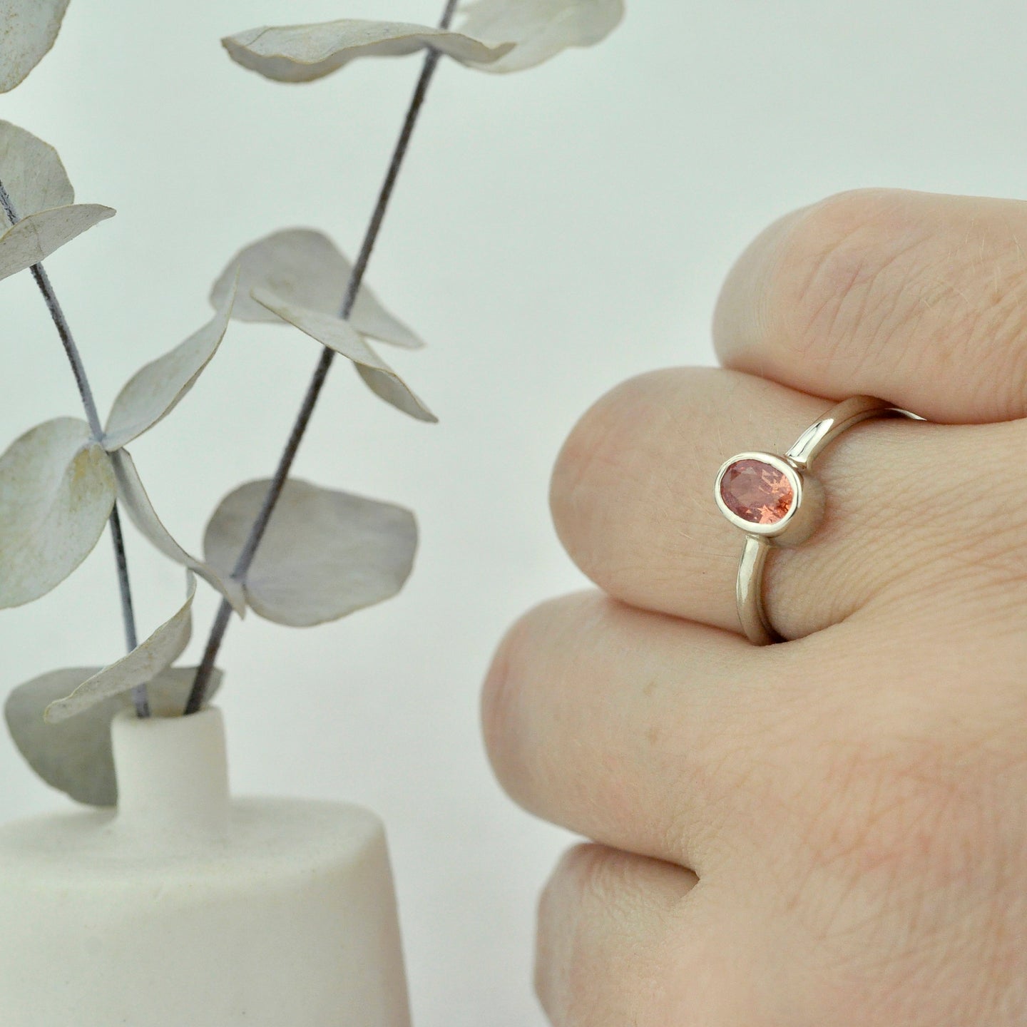 9ct white gold oval Peach Padparadscha Sapphire bezel set ring