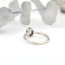 14kt white gold oval Purple Sapphire bezel set ring