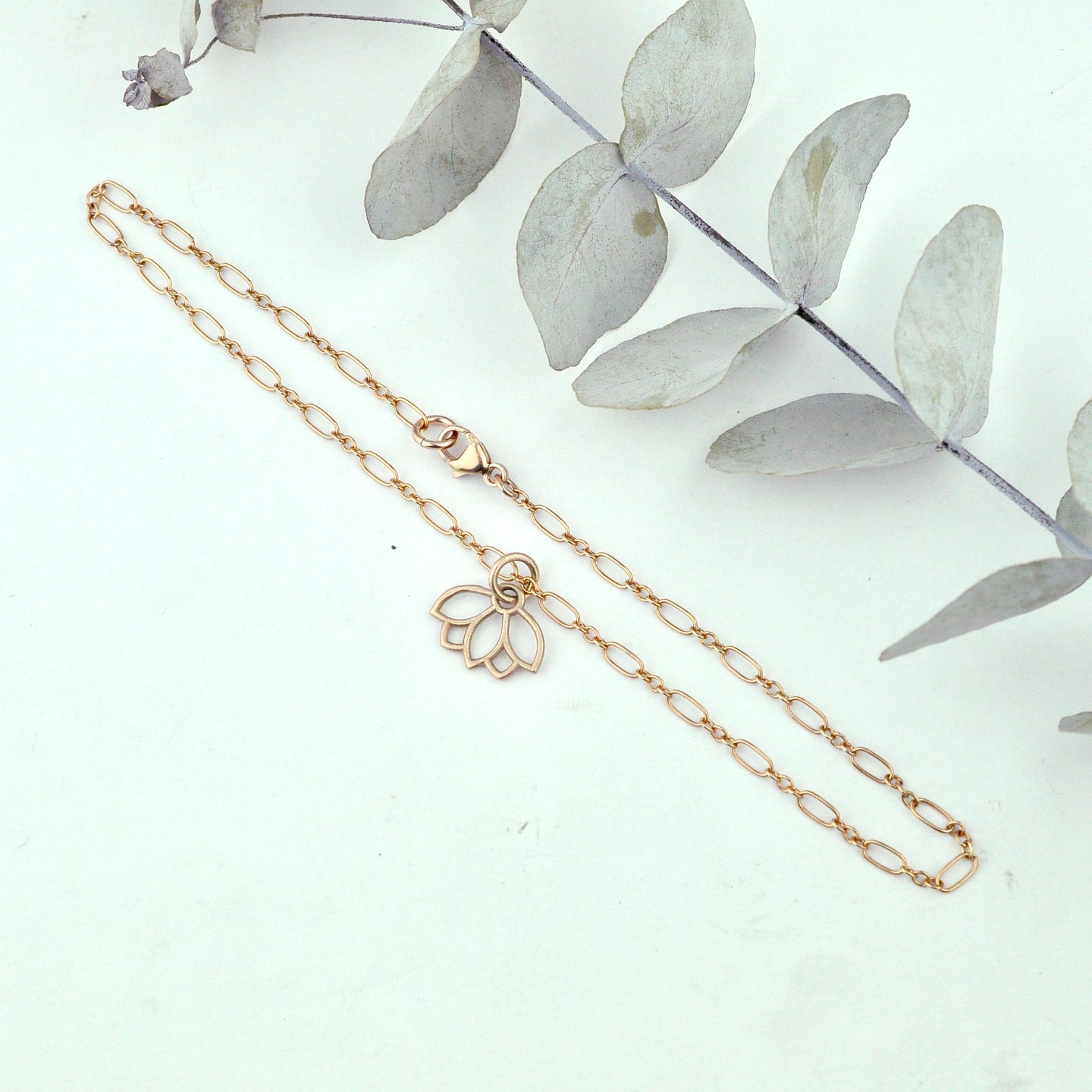 Anklet 9ct rose gold lotus charm, gold fill chain. Optional birthstone beads.