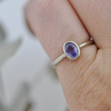 14kt white gold oval Purple Sapphire bezel set ring