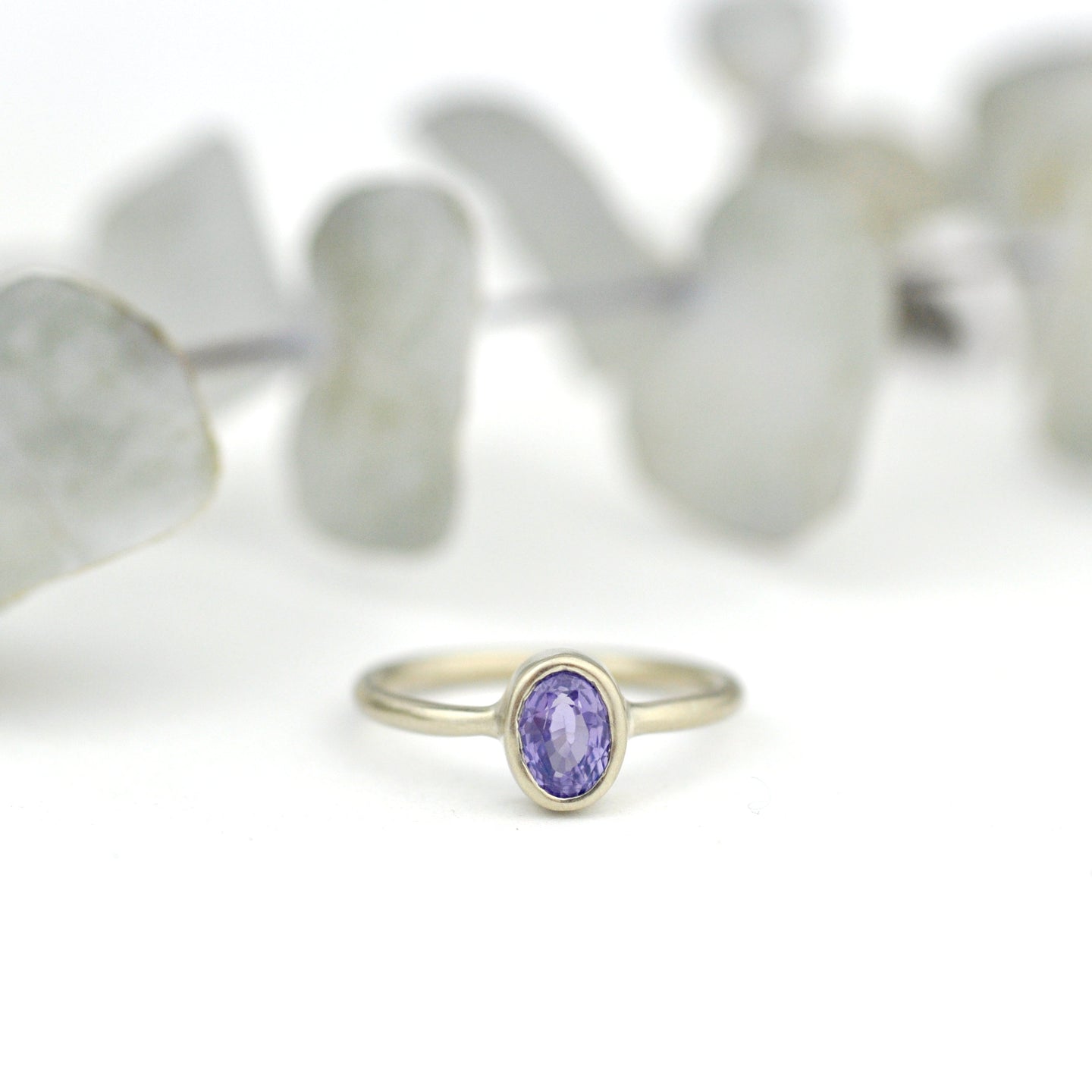 14kt white gold oval Purple Sapphire bezel set ring