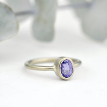14kt white gold oval Purple Sapphire bezel set ring