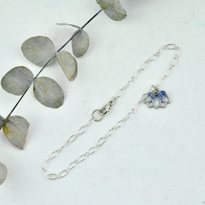 Sterling silver bracelet with Lotus petal charm, optional birthstone beads.