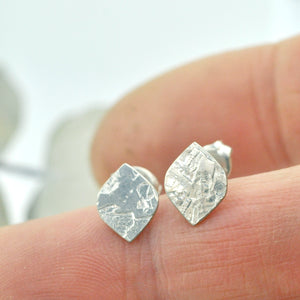 Textured sterling silver marquise shaped studs