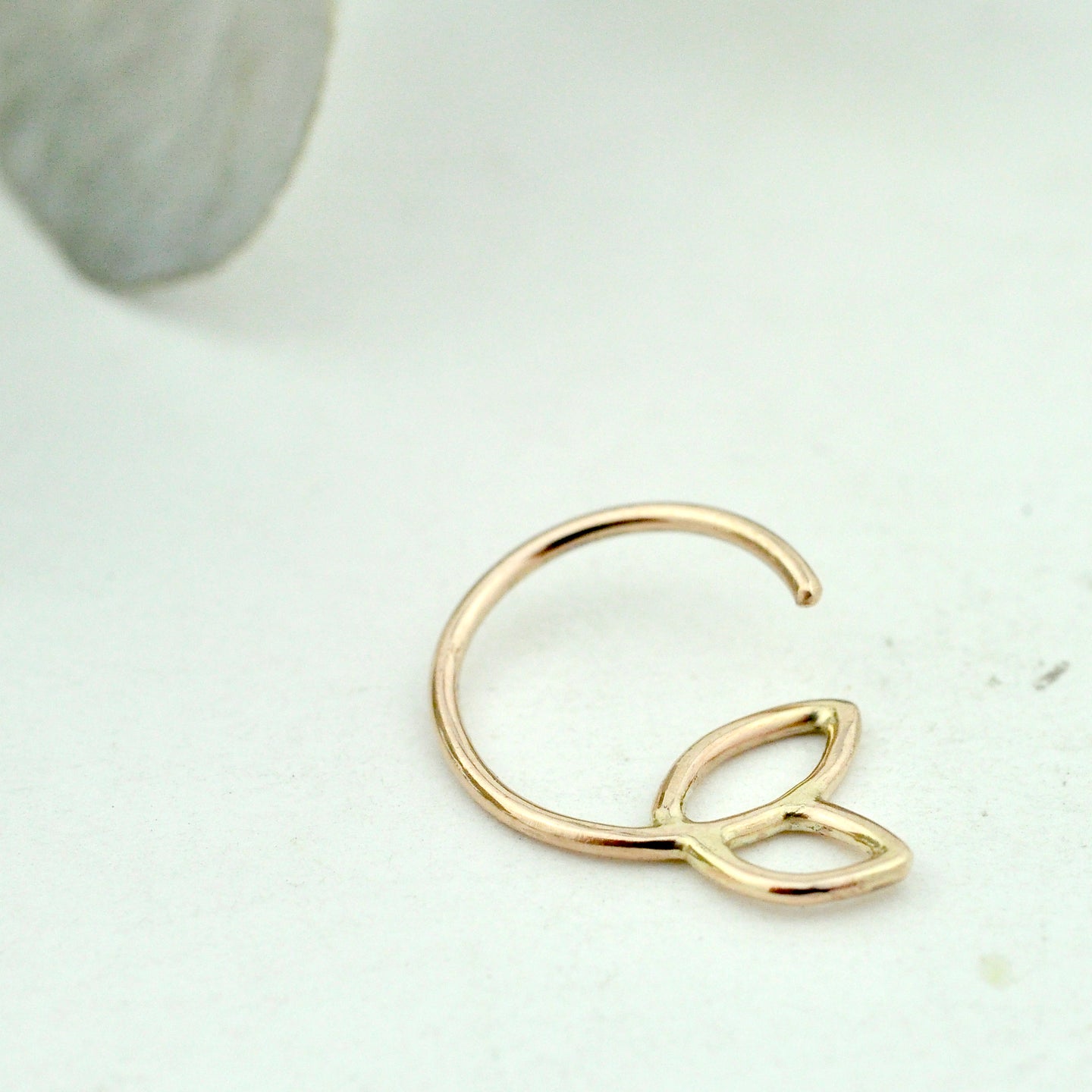 SINGLE 9ct yellow gold Tiny leaf sleeper hoop.